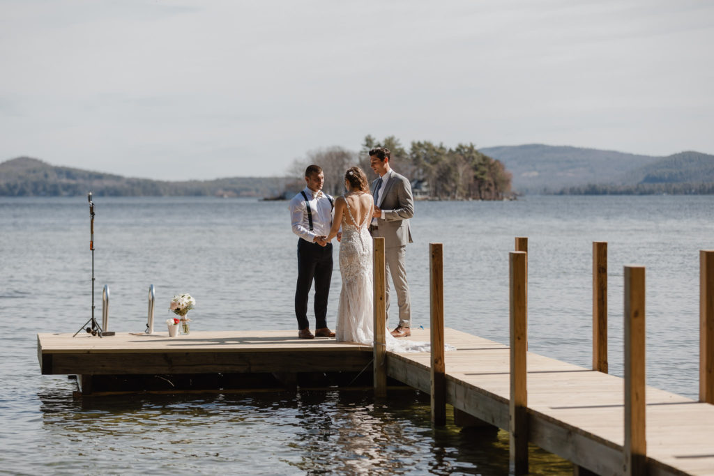 Intimate elopement in the Lakes Region of New Hampshire. This elopement was on the lake with just the two of them and a friend who married them.