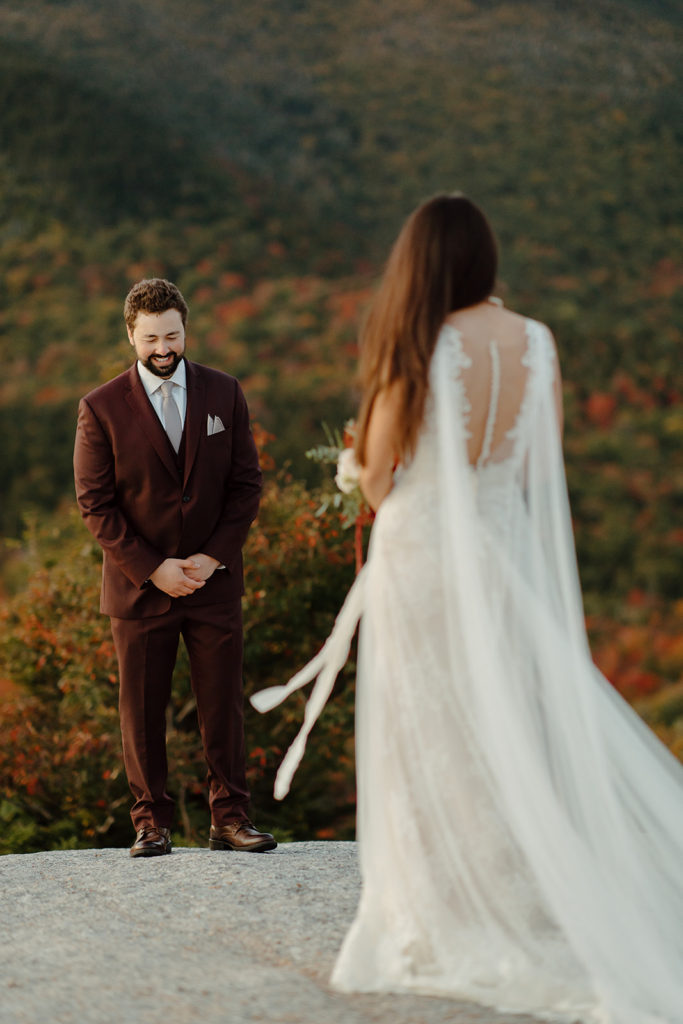 Crawford Notch elopement photo with groom seeing bride for the first time