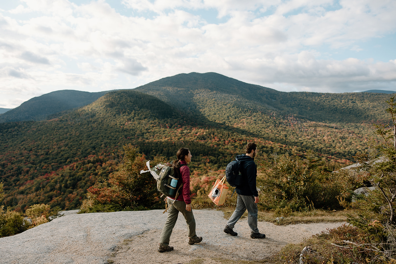 hiking couple a their adventure elopement in White Mountains