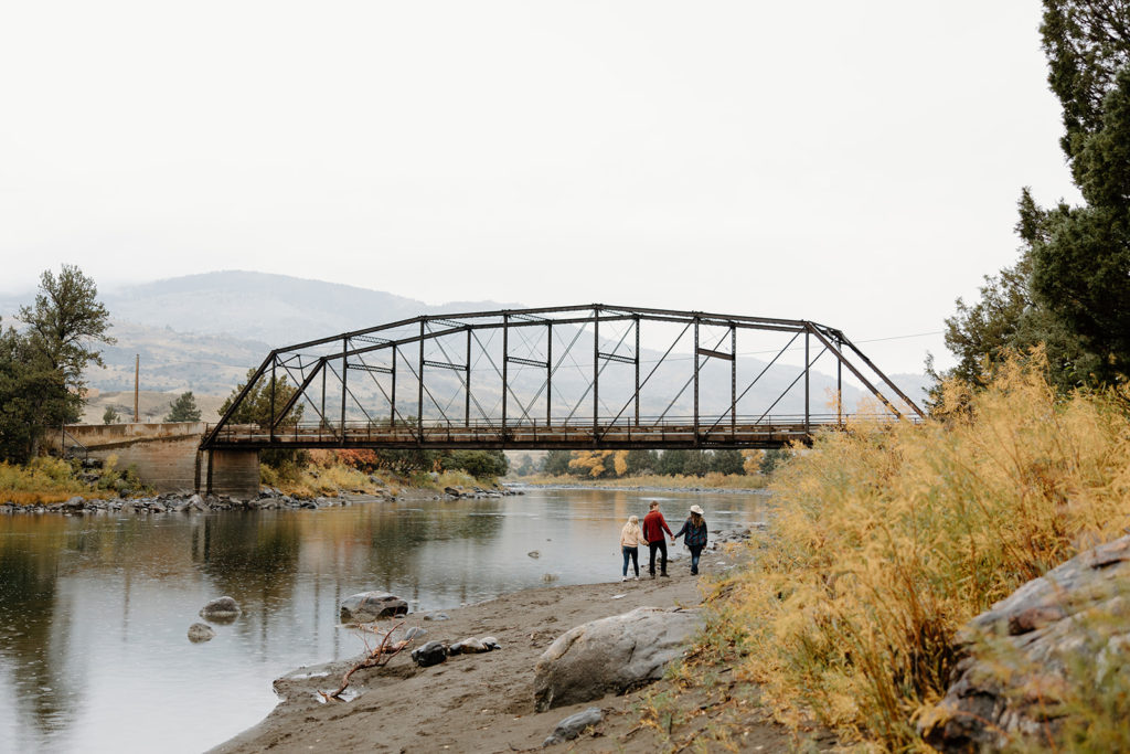 Family on a hike by the river, pre-elopement adventure