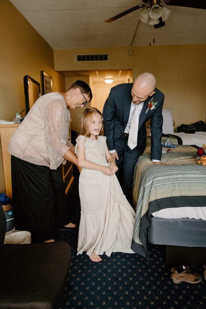 Groom and daughter getting ready for elopement