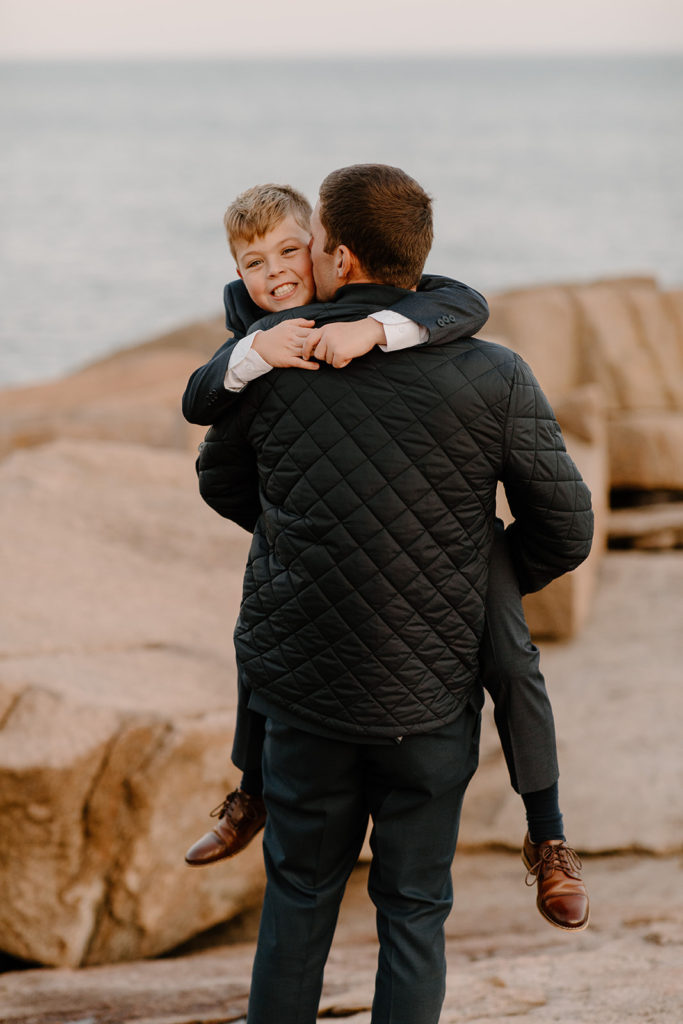 Little boy hugging father at his elopement