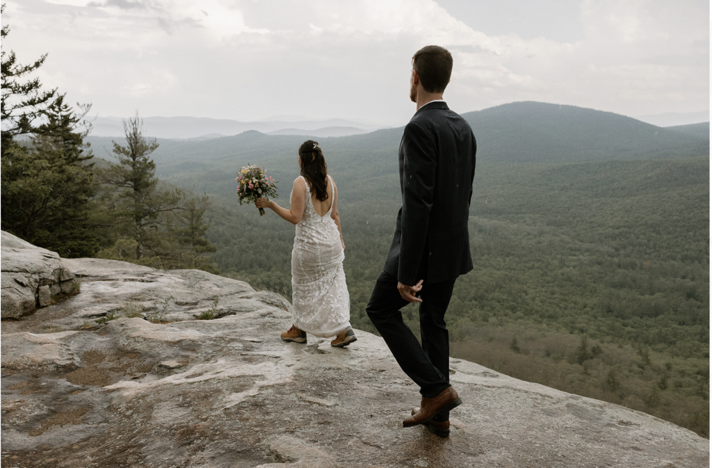 bride and groom hiking in White mountains wedding