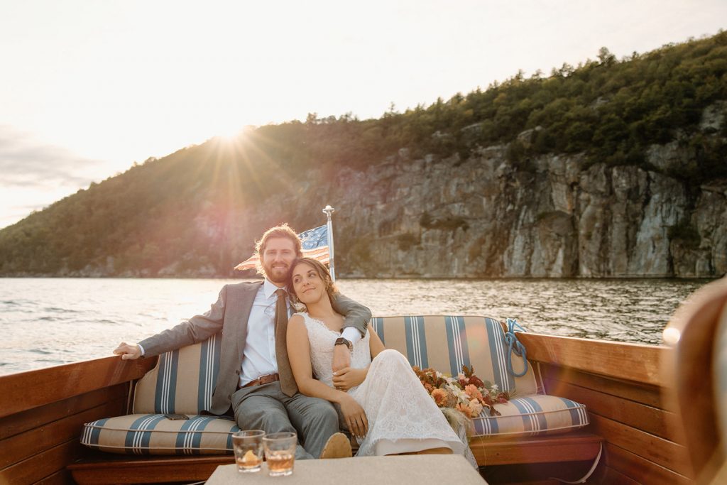 Vermont elopement on Lake Bomoseen with an antique boat.