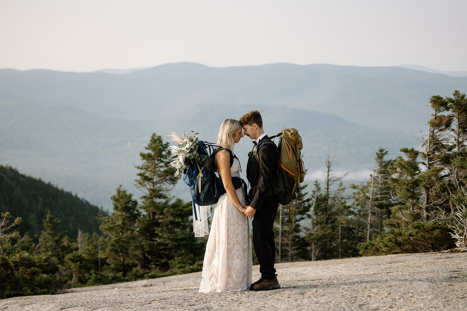 Adventure bride and groom in New Hampshire