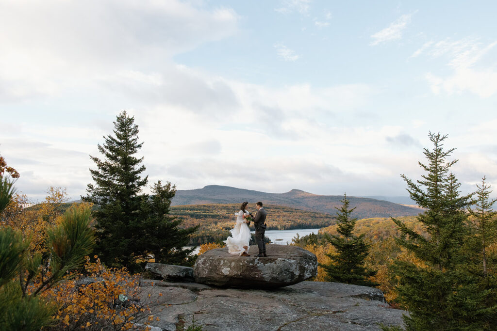 Catskills Hudson Valley elopement in the Fall on top of a mountain at sunrise.