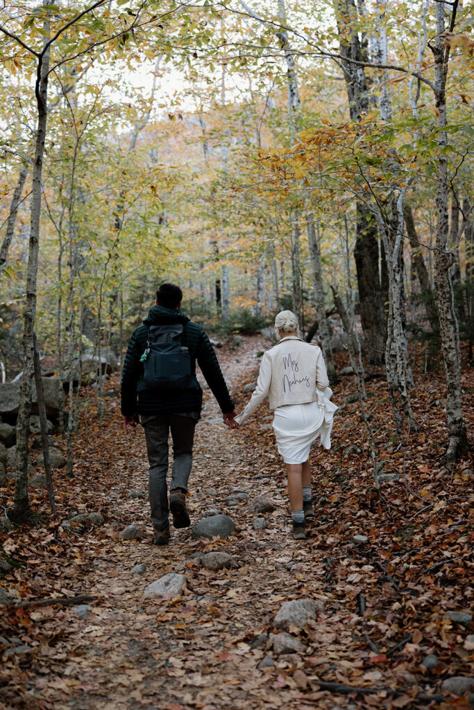 bride and groom hiking